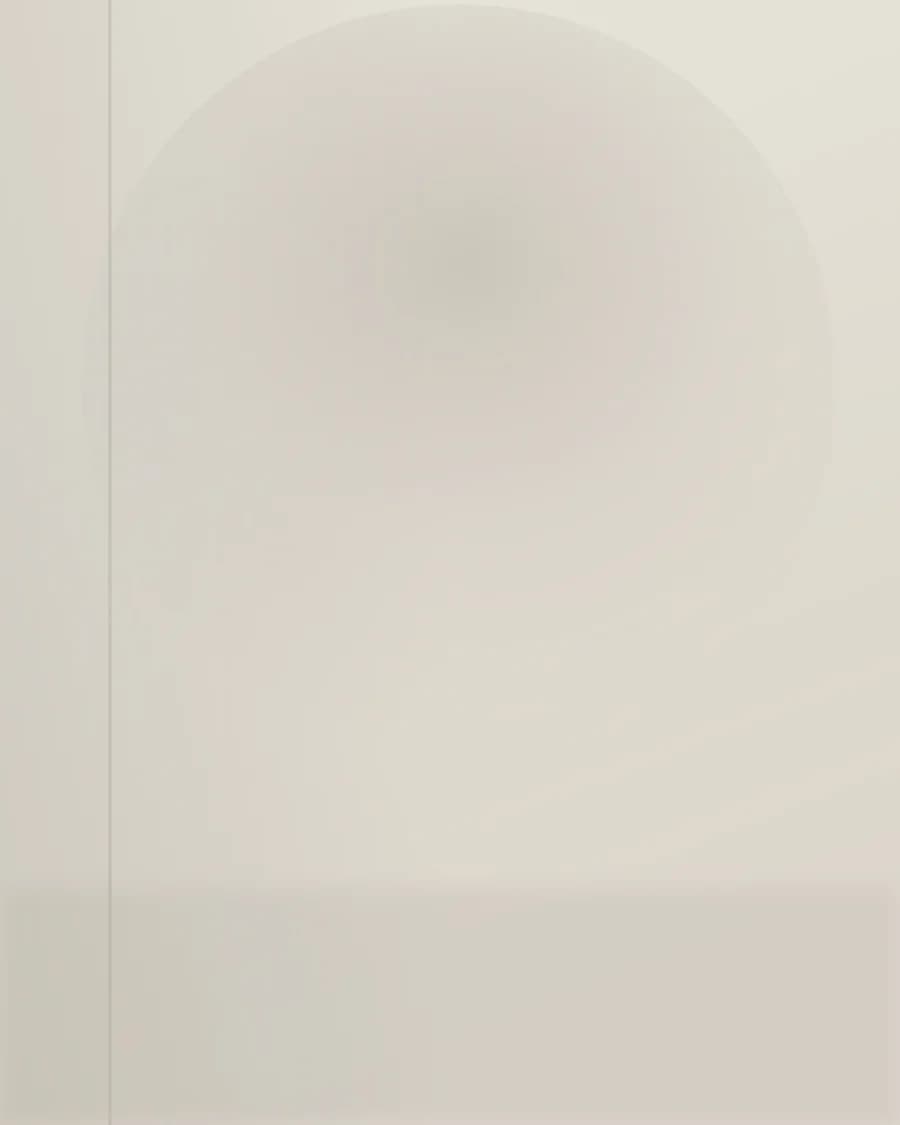 Monolith low table — solid stone volume in daylight