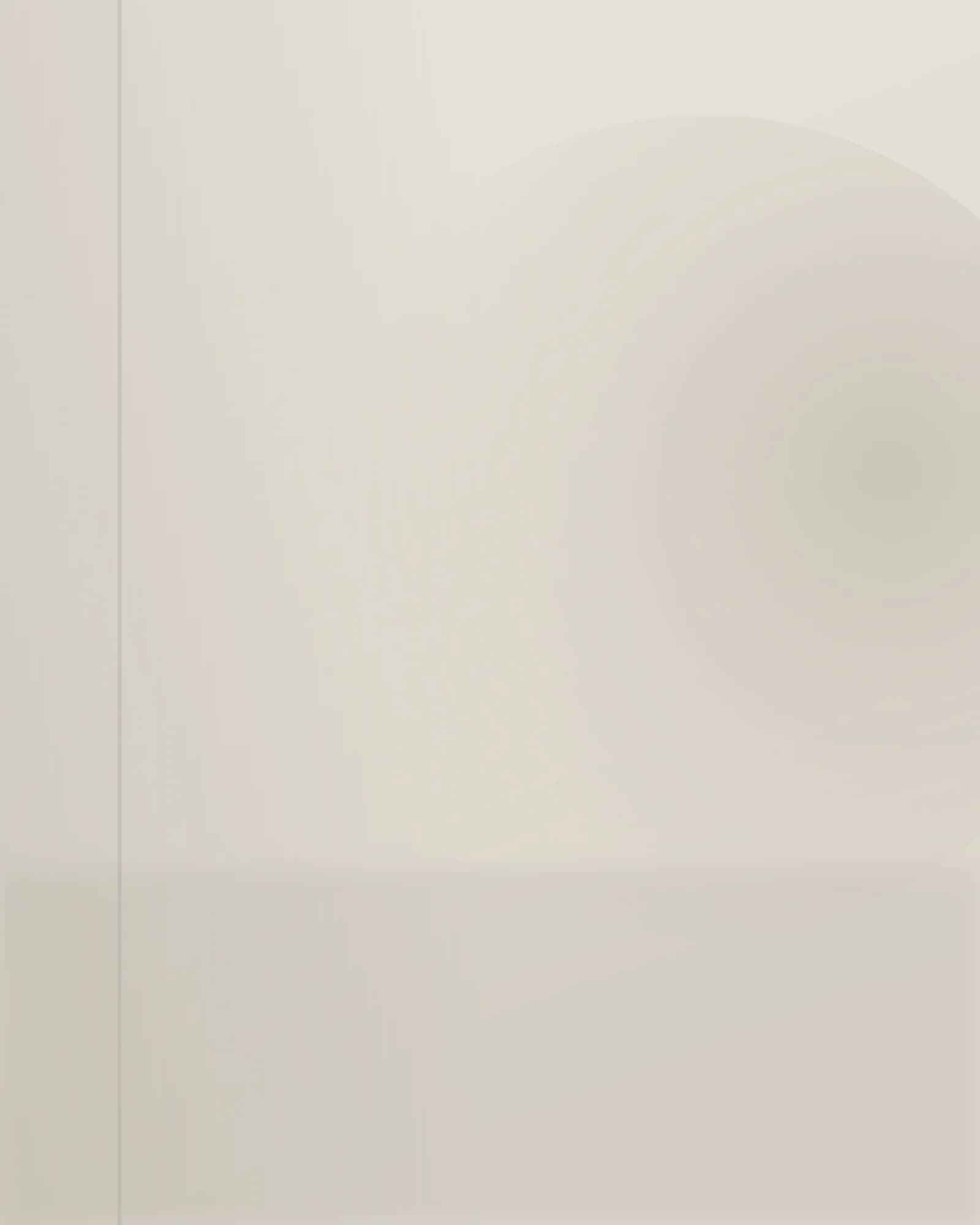 Monolith low table — edge detail with honed surface